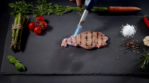 Preparing Meat On Professional Table With Vegetables On Black Background Stock Footage 170241984