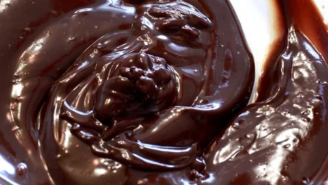 Preparing melted chocolate for making cake Video stock 81892217