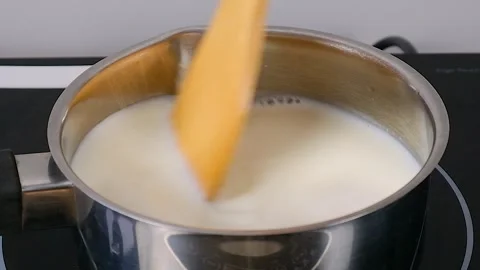 Preparing milk cream for the cake Stock Footage 256655660