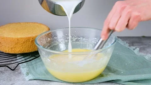Preparing milk cream for the cake Stock Footage 256655698