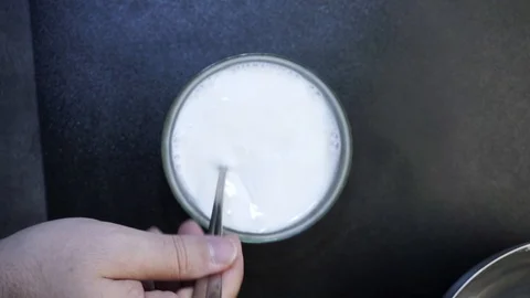 Preparing milk jelly Stock Footage 97410361