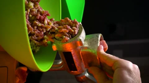 Preparing minced meat with a manual meat grinder Stock Footage 305648404