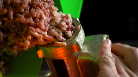 Preparing minced meat with a manual meat grinder Stock Footage 305648514