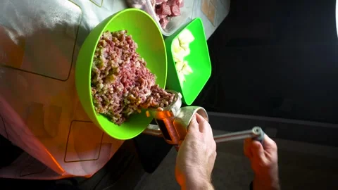 Preparing minced meat with a manual meat grinder Stock Footage 305648524
