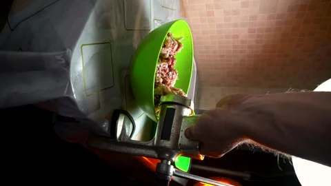 Preparing minced meat with a manual meat grinder Stock Footage 305648562
