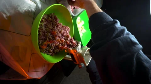 Preparing minced meat with a manual meat grinder Stock Footage 305648563