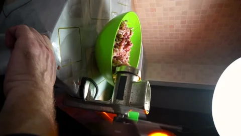 Preparing minced meat with a manual meat grinder Stock Footage 305648589