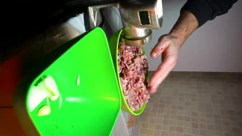 Preparing minced meat with a manual meat grinder Stock Footage 305648695
