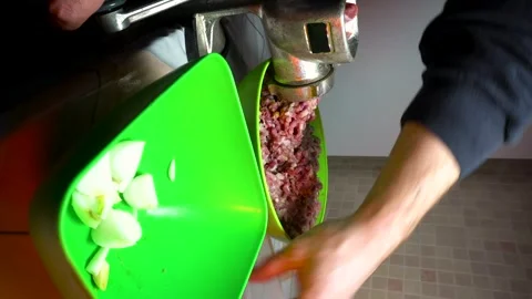 Preparing minced meat with a manual meat grinder Stock Footage 305648699