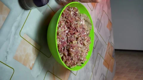 Preparing minced meat with a manual meat grinder Stock Footage 305648712