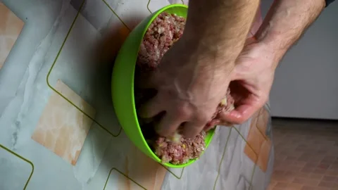 Preparing minced meat with a manual meat grinder Stock Footage 305648813