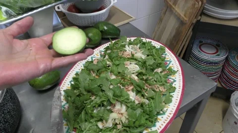 Preparing a mixed salad in a restaurant Stock Footage 160598210