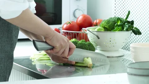 Preparing Mixed Vegetables in Kitchen 動画素材 334280234