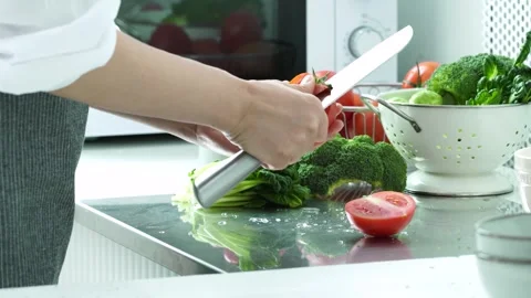 Preparing Mixed Vegetables in Kitchen 動画素材 334280326