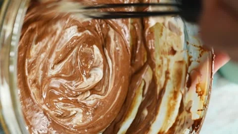 Preparing  mixture for a chocolate semifreddo. Vertical video. Stock Footage 305154785