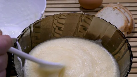 Preparing mixture for french toast Stock-Footage 88253392