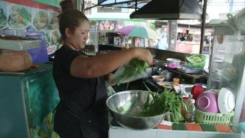 Preparing Morning Glory Vegetable Stock Footage 146235652