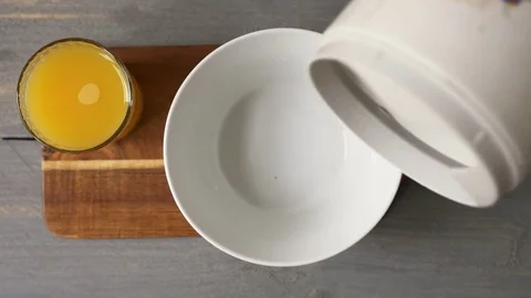 Preparing a muesli breakfast Video stock 70749875