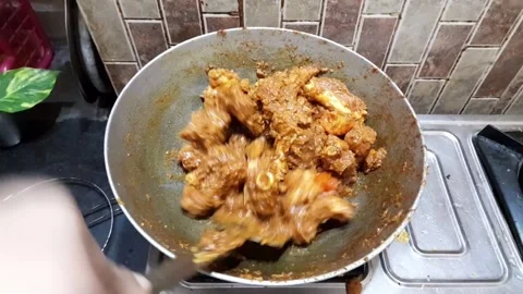 Preparing mutton kasha meaning mutton curry or spicy mutton gravy Stock Footage 138753047