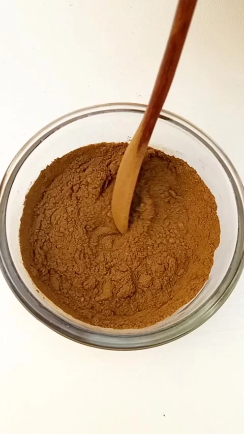 Preparing Natural Henna Paste in Glass Bowl on White Background, Henna Paste Stock Footage 339536454