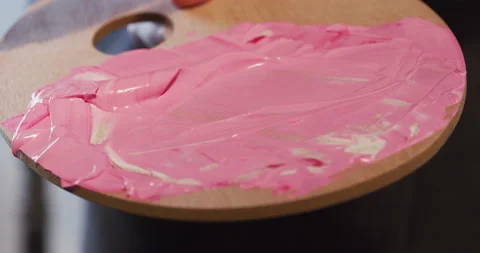 Preparing a new drawing color mix using bare hand Stock Footage 130961981