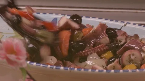 Preparing octopus with vegetables Stock Footage 77482021