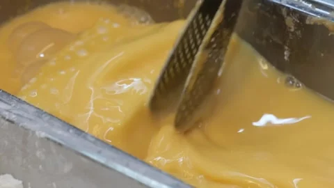 Preparing One-Pan Egg Toast Dipping Bread in Beaten Egg Mixture for Breakfast Stock Footage 333569281