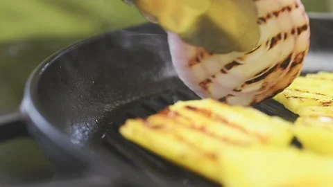 Preparing onion slice on a grill pan. Stock Footage 159401271