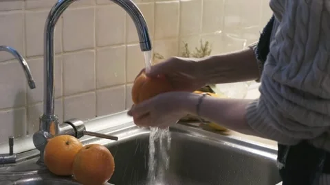 Preparing oranges to eat Stock Footage 262311089