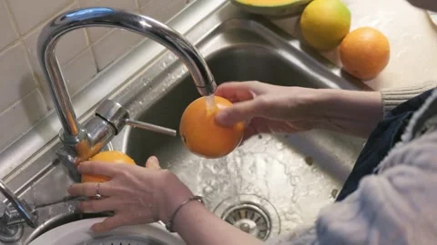 Preparing oranges to eat Stock Footage 262311177