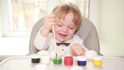 Preparing paint for Easter eggs Stock Footage 149847006