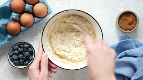 Preparing pancake batter in a bowl Video stock 158296512