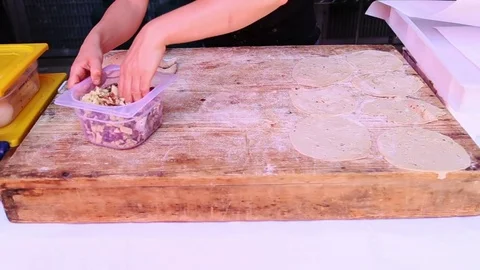 Preparing Panzerotti on Table Stock Footage 79055375