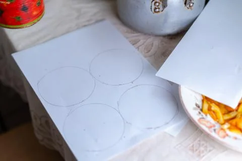 Preparing paper for baking dough Stock Photos