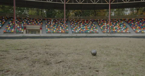 Preparing for the Paralympic Games by throwing a kettlebell ball at the stadium Video stock 154249840
