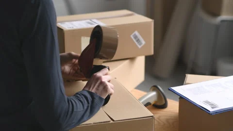 Preparing parcel before shipment Stock Footage 199061494