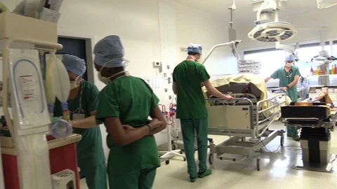 Preparing the patient in the operation block Stock Footage 85897024