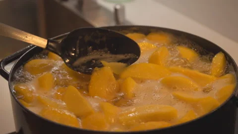 Preparing peach compote Stock Footage 145646787