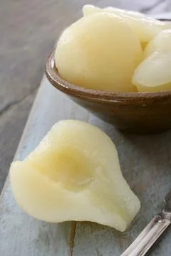 Preparing peeled pears Stock Photos