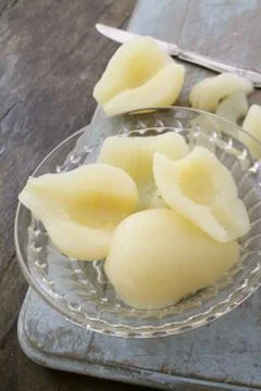 Preparing peeled pears Stock Photos