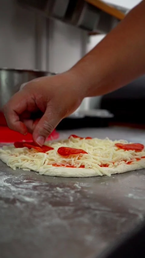 Preparing pepperoni pizza Stock Footage 298724800