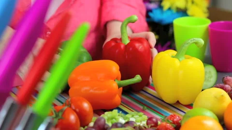 Preparing peppers in colorful kitchen scene Stock Footage 42183003