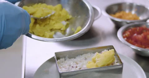 Preparing Peruvian Causa – Authentic Cooking stock video Stock Footage 290998873