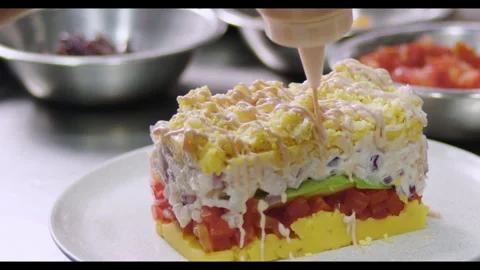 Preparing Peruvian Causa – Authentic Cooking stock video Stock Footage 290998893