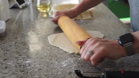 Preparing pie dough with rolling pin Stock Footage 131113343