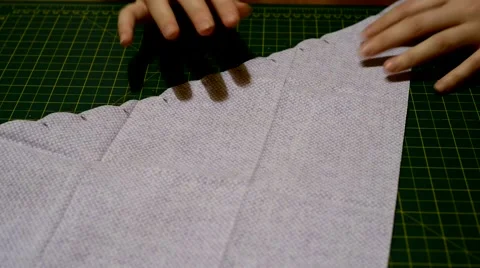Preparing piece of fabric for sewing Video stock 46054617