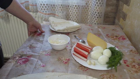 Preparing pita bread with filling Stock Footage 310680484