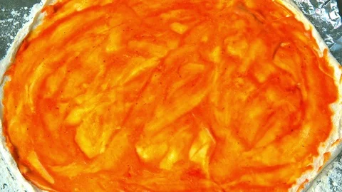 Preparing the pizza for baking Stock Footage 72574562