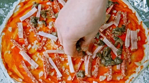 Preparing the pizza for baking Stock Footage 73373565