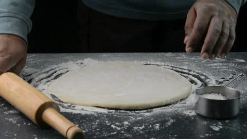 Preparing pizza dough 動画素材 163944900